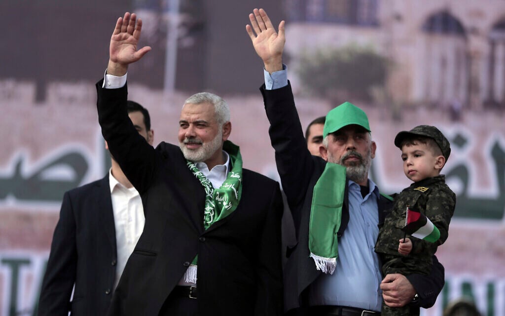 Head of the Hamas political bureau, Ismail Haniyeh (left) and Hamas leader in the Gaza Strip Yahya Sinwar (right) at a rally marking the 30th anniversary of the terror group, in Gaza City, December 14, 2017. (AP Photo/ Khalil Hamra) Head of the Hamas political bureau, Ismail Haniyeh (left) and Hamas leader in the Gaza Strip Yahya Sinwar (right) at a rally marking the 30th anniversary of the terror group, in Gaza City, December 14, 2017. (AP Photo/ Khalil Hamra)