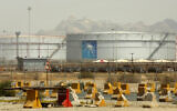 File: Storage tanks are seen at the North Jeddah bulk plant, an Aramco oil facility, in Jeddah, Saudi Arabia, on March 21, 2021. (AP Photo/Amr Nabil)