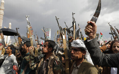 Houthi supporters attend an anti-Israel and anti-American rally in Sanaa, Yemen, Friday, August 16, 2024. (AP Photo/Osamah Abdulrahman)