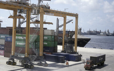 Illustrative: A ship is loaded with containers at the Mediterranean port of Alexandria, Egypt, Thursday, Aug. 22, 2024. (AP/Amr Nabil)