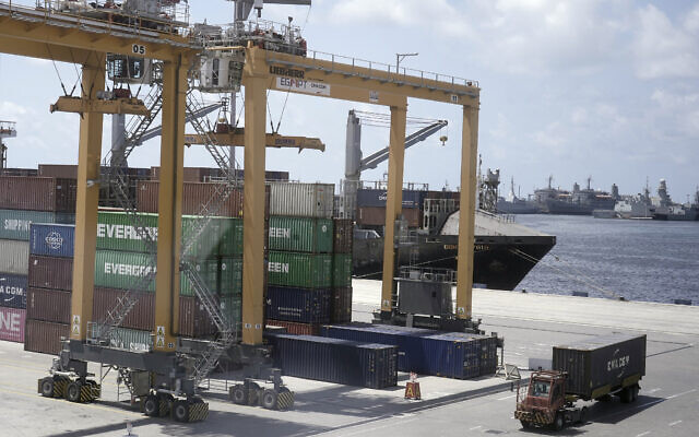 Illustrative: A ship is loaded with containers at the Mediterranean port of Alexandria, Egypt, Thursday, Aug. 22, 2024. (AP/Amr Nabil) Illustrative: A ship is loaded with containers at the Mediterranean port of Alexandria, Egypt, Thursday, Aug. 22, 2024. (AP/Amr Nabil)
