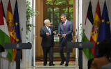 Palestinian Authority President Mahmoud Abbas, left, and Spain's Prime Minister Pedro Sanchez arrive for a joint statement at the Moncloa palace in Madrid, Spain, September 19, 2024. (AP Photo/Paul White)