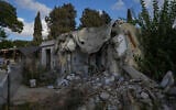 Illustrative: The remains of a house in what used to be the young people's section of Kibbutz Kfar Aza are seen on September 16, 2024. (AP Photo/Ohad Zwigenberg)