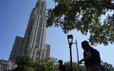 The Cathedral of Learning towers over the University of Pittsburgh campus in the Oakland section of Pittsburgh, September 12, 2024. (AP Photo/Gene J. Puskar)