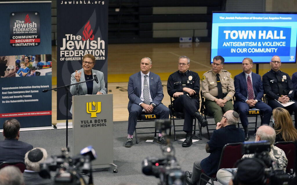 Illustrative: Los Angeles Mayor Karen Bass, at podium, addresses community members and other local, state law enforcement officials in a town hall on antisemitic violence at YULA Boys High School in Los Angeles, February 20, 2023. (AP Photo/Damian Dovarganes, File) Illustrative: Los Angeles Mayor Karen Bass, at podium, addresses community members and other local, state law enforcement officials in a town hall on antisemitic violence at YULA Boys High School in Los Angeles, February 20, 2023. (AP Photo/Damian Dovarganes, File)