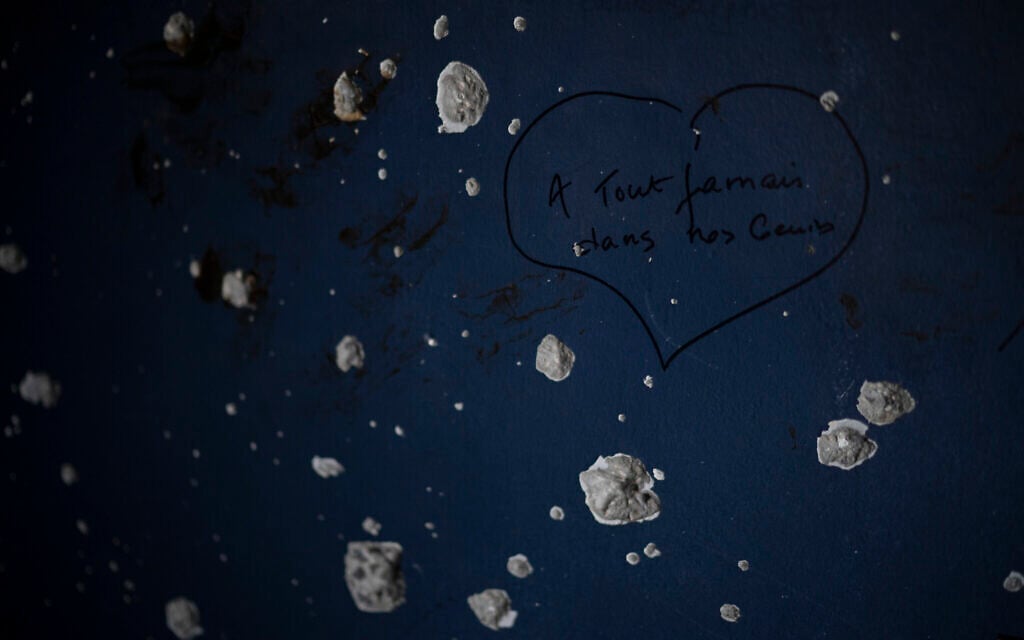 Bullet holes and shrapnel pockmark the wall of a roadside bomb shelter near Sderot, where Hamas terrorists stormed the police station during the October 7 onslaught, seen on September 10, 2024. (AP Photo/Leo Correa)