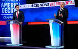 US vice presidential candidates JD Vance (L) and Tim Walz (R) participate in a debate hosted by CBS News in New York, October 1, 2024. (AP Photo/Matt Rourke)