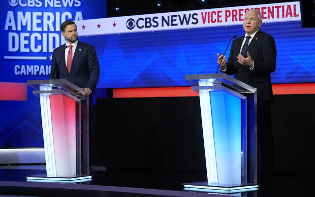 US vice presidential candidates JD Vance (L) and Tim Walz (R) participate in a debate hosted by CBS News in New York, October 1, 2024. (AP Photo/Matt Rourke) US vice presidential candidates JD Vance (L) and Tim Walz (R) participate in a debate hosted by CBS News in New York, October 1, 2024. (AP Photo/Matt Rourke)
