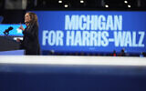 Democratic presidential nominee US Vice President Kamala Harris speaks during a rally at the Dort Financial Center in Flint, Mich., Friday, Oct. 4, 2024. (AP Photo/Mark Schiefelbein)