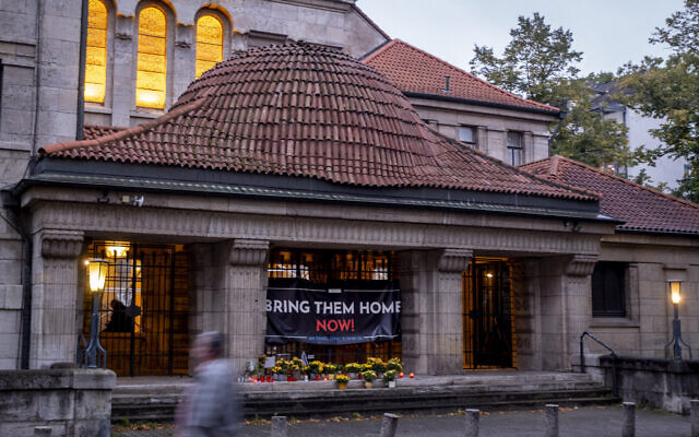 Candles and flowers are laid at the entrance of the synagogue to mark the first anniversary of the Hamas terror attack on Israel, Frankfurt, Germany, October 7, 2024. (Michael Probst/AP) Candles and flowers are laid at the entrance of the synagogue to mark the first anniversary of the Hamas terror attack on Israel, Frankfurt, Germany, October 7, 2024. (Michael Probst/AP)