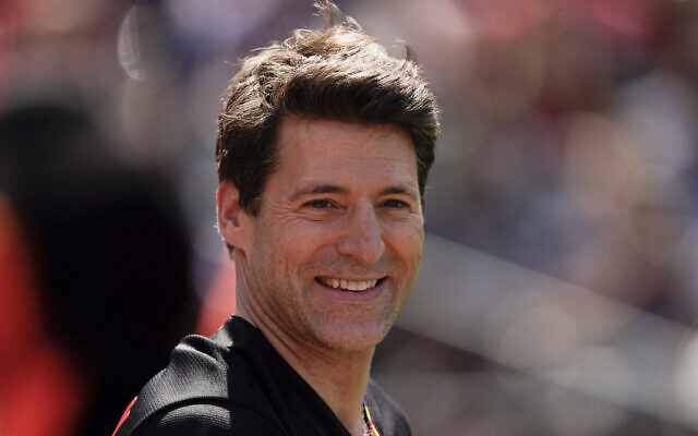 FILE - Tony Dokoupil, co-host of "CBS This Morning," looks on before throwing a ceremonial first pitch prior to a baseball game between the Baltimore Orioles and the Texas Rangers, May 27, 2023, in Baltimore. (AP Photo/Julio Cortez, File) FILE - Tony Dokoupil, co-host of "CBS This Morning," looks on before throwing a ceremonial first pitch prior to a baseball game between the Baltimore Orioles and the Texas Rangers, May 27, 2023, in Baltimore. (AP Photo/Julio Cortez, File)