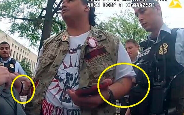This image from police-worn body camera, and provided and annotated by the US Justice Department, in the affidavit to support the criminal complaint and arrest warrant for Zachary Allen Kam, shows Kam during his arrest July 24, 2024, during protests in Washington against Prime Minister Benjamin Netanyahu's address to the US Congress. (US Department of Justice via AP) This image from police-worn body camera, and provided and annotated by the US Justice Department, in the affidavit to support the criminal complaint and arrest warrant for Zachary Allen Kam, shows Kam during his arrest July 24, 2024, during protests in Washington against Prime Minister Benjamin Netanyahu's address to the US Congress. (US Department of Justice via AP)