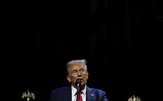 Republican presidential nominee former US president Donald Trump speaks at a meeting of the Detroit Economic Club, Thursday, Oct. 10, 2024, in Detroit. (AP Photo/Julia Demaree Nikhinson) Republican presidential nominee former US president Donald Trump speaks at a meeting of the Detroit Economic Club, Thursday, Oct. 10, 2024, in Detroit. (AP Photo/Julia Demaree Nikhinson)