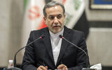 Iranian Foreign Minister Abbas Araghchi speaks during a joint press conference with his Iraqi counterpart Fouad Hussein (not in picture) during his visit to Baghdad, Iraq, October 13, 2024. (AP/Anmar Khalil)