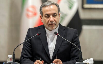 Iranian Foreign Minister Abbas Araghchi speaks during a joint press conference with his Iraqi counterpart Fouad Hussein (not in picture) during his visit to Baghdad, Iraq, October 13, 2024. (AP/Anmar Khalil)
