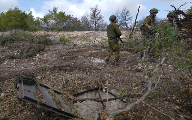 IDF soldiers display an entrance to a Hezbollah tunnel found during their ground operation in southern Lebanon, near the border with Israel, October 13, 2024. (AP Photo/Sam McNeil) IDF soldiers display an entrance to a Hezbollah tunnel found during their ground operation in southern Lebanon, near the border with Israel, October 13, 2024. (AP Photo/Sam McNeil)