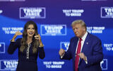Republican presidential nominee and former US President Donald Trump, right, and South Dakota Governor Kristi Noem dance to the song 'YMCA' at a campaign town hall at the Greater Philadelphia Expo Center in Oaks, Pennsylvania, October 14, 2024. (AP Photo/Matt Rourke)