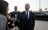 US President Joe Biden talks to the media before departing from the Brandenburg Airport in Berlin, Germany, October 18, 2024. (AP Photo/Ben Curtis)