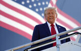 Republican presidential nominee former President Donald Trump arrives at Detroit Metropolitan Wayne County Airport, October 18, 2024, in Detroit. (AP Photo/Evan Vucci)