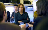 Democratic presidential nominee Vice President Kamala Harris speaks with members of the press on board Air Force Two at Philadelphia International Airport, October 21, 2024, in Philadelphia, before departing to Michigan. (AP Photo/Jacquelyn Martin, Pool)