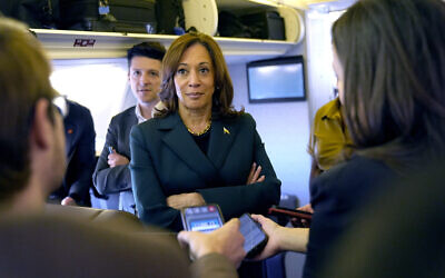Democratic presidential nominee Vice President Kamala Harris speaks with members of the press on board Air Force Two at Philadelphia International Airport, October 21, 2024, in Philadelphia, before departing to Michigan. (AP Photo/Jacquelyn Martin, Pool)