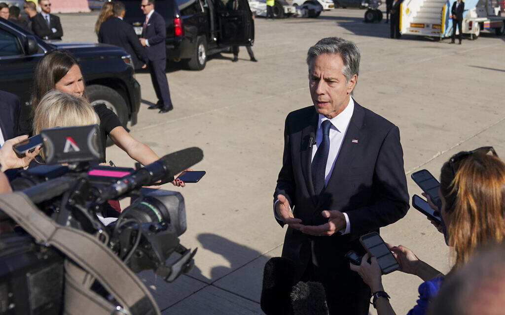 US Secretary of State Antony Blinken speaks with members of the media at Ben Gurion Airport before departing for Riyadh, Saudi Arabia, in Tel Aviv, Oct. 23, 2024. (Nathan Howard/Pool Photo via AP)