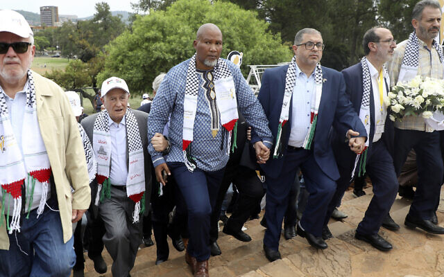 Nelson Mandela's grandson Mandla Mandela, center, with Hamas official Basem Naim, center right, during a march to commemorate the 10th anniversary of the death of former South African president Nelson Mandela in Pretoria, South Africa, Tuesday, Dec. 5, 2023. (AP Photo, File) Nelson Mandela's grandson Mandla Mandela, center, with Hamas official Basem Naim, center right, during a march to commemorate the 10th anniversary of the death of former South African president Nelson Mandela in Pretoria, South Africa, Tuesday, Dec. 5, 2023. (AP Photo, File)