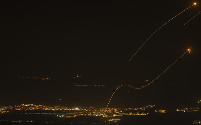 The Iron Dome air defense system fires to intercept rockets launched from Lebanon, near Kiryat Shmona, as seen from the Golan Heights, October 26, 2024. (AP Photo/ Leo Correa) The Iron Dome air defense system fires to intercept rockets launched from Lebanon, near Kiryat Shmona, as seen from the Golan Heights, October 26, 2024. (AP Photo/ Leo Correa)