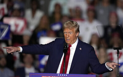 Republican presidential nominee and former US president Donald Trump speaks at a campaign rally at McCamish Pavilion, October 28, 2024, in Atlanta. (AP Photo/Mike Stewart)