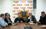 File: MK Ayman Odeh (center left) and MK Ahmad Tibi (center right) attend Hadash–Ta'al faction meeting, at the Knesset, in Jerusalem, on February 19, 2024. (Yonatan Sindel/Flash90)