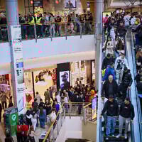 Illustrative: People shopping at the Azrieli mall in Tel Aviv, during the Municipal Elections, February 27, 2024. (Flash90)