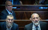 MK Moshe Gafni, left, with MK Aryeh Deri at the Knesset in Jerusalem, March 13, 2024. (Yonatan Sindel/Flash90)