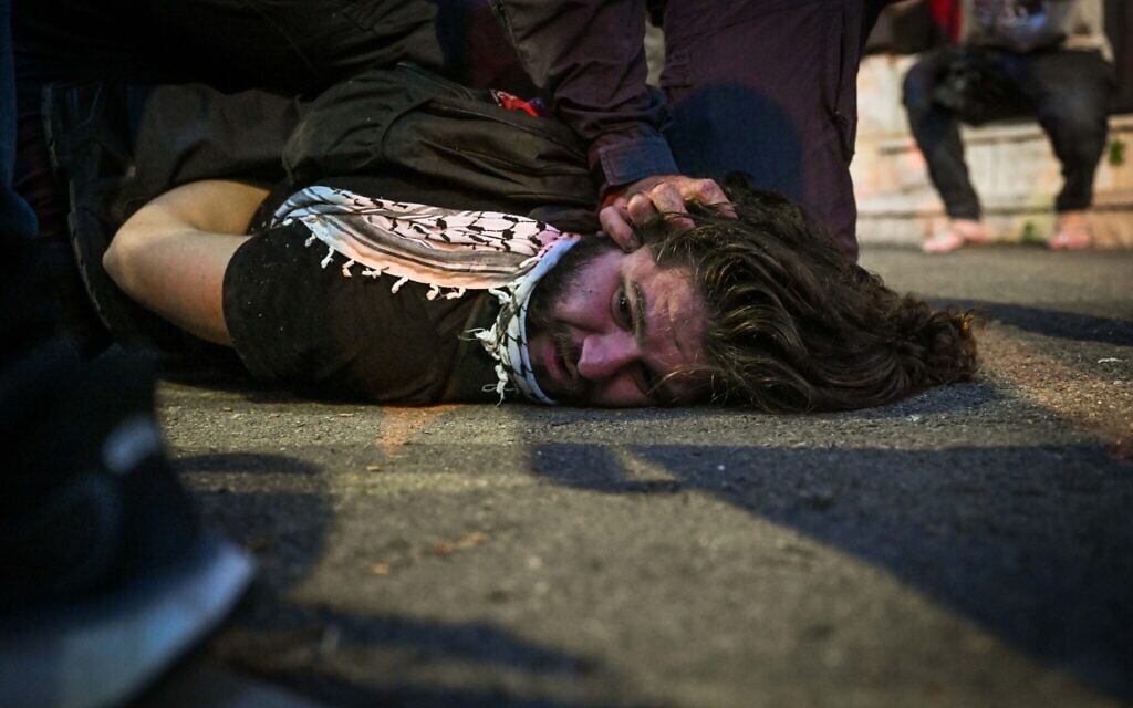 Activists clash with police in the northern Israeli city of Haifa during a protest against the war in Gaza, May 30, 2024. (Flash90) Activists clash with police in the northern Israeli city of Haifa during a protest against the war in Gaza, May 30, 2024. (Flash90)