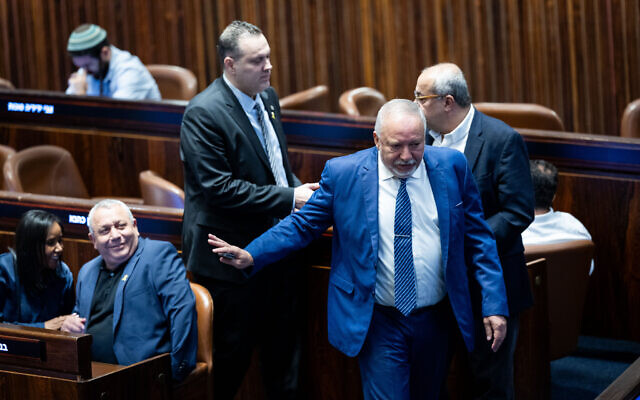 MK Avigdor Liberman and MK Gadi Eisenkot at a plenum session at the assembly hall of the Knesset in Jerusalem, September 9, 2024. (Yonatan Sindel/Flash90) MK Avigdor Liberman and MK Gadi Eisenkot at a plenum session at the assembly hall of the Knesset in Jerusalem, September 9, 2024. (Yonatan Sindel/Flash90)