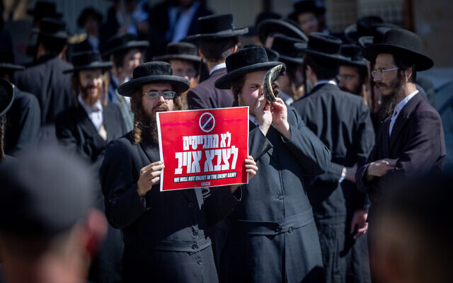 Ultra-Orthodox Jews protest against the draft outside the IDF Recruitment Center in Jerusalem, September 29, 2024. (Yonatan Sindel/Flash90) Ultra-Orthodox Jews protest against the draft outside the IDF Recruitment Center in Jerusalem, September 29, 2024. (Yonatan Sindel/Flash90)