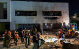Israeli security forces at the scene where a missile fired from Iran hit a school in the town of Gedera, October 1, 2024. (Liron Moldovan/Flash90)
