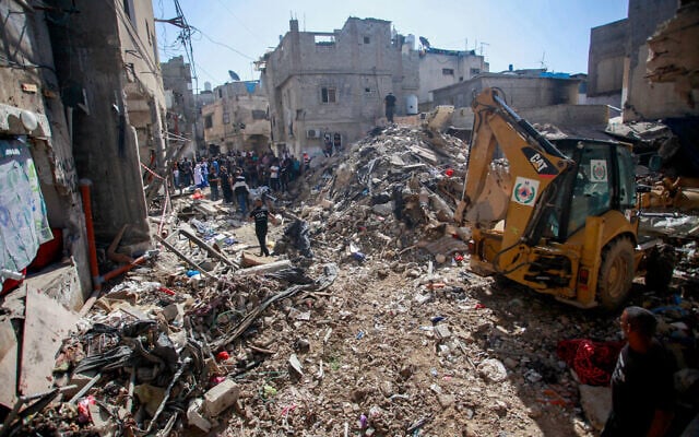 Palestinians inspect the damage caused by an Israeli airstrike in the West Bank city of Tulkarem, October 4, 2024. (Nasser Ishtayeh/Flash90) Palestinians inspect the damage caused by an Israeli airstrike in the West Bank city of Tulkarem, October 4, 2024. (Nasser Ishtayeh/Flash90)