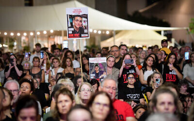 Israelis attend an event calling for the release of hostages still held captive by Hamas terrorists in Gaza, and in memory of those killed in the group's attack last October 7, on the eve of the first anniversary of the attack, at "Hostage Square" in Tel Aviv, October 6, 2024. (Avshalom Sassoni/Flash90)