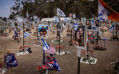 Israelis visit the site of the October 7, 2023, Reim-area Nova music festival massacre, on October 6, 2024. (Yonatan Sindel/Flash90)