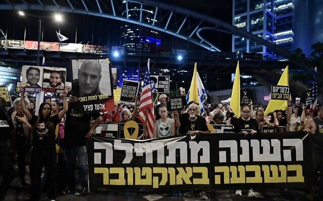 Families of Israelis held kidnapped by Hamas terrorists in Gaza and activists protest for their release outside the Defense Ministry headquarters in Tel Aviv, October 7, 2024. (Tomer Neuberg/Flash90) Families of Israelis held kidnapped by Hamas terrorists in Gaza and activists protest for their release outside the Defense Ministry headquarters in Tel Aviv, October 7, 2024. (Tomer Neuberg/Flash90)