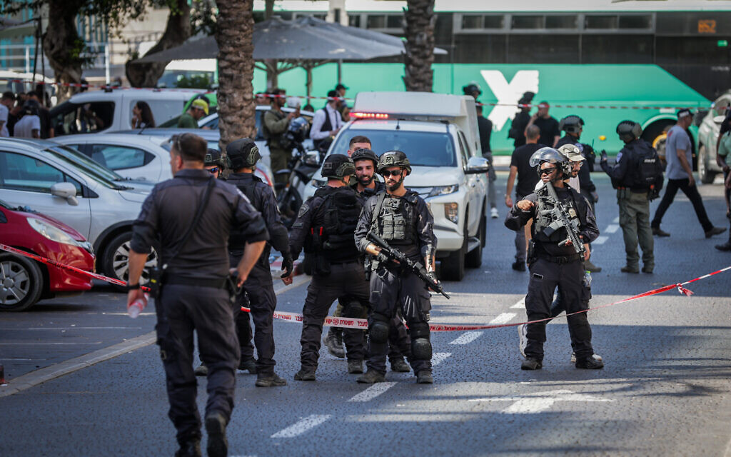 Security forces at the scene of a terror attack in Hadera, October 9, 2024 (Tal Gal/Flash90)