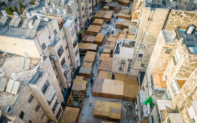 A street full of sukkas in the religious neighborhood of Sorotzkin in Jerusalem on October 15, 2024. (Chaim Goldberg/Flash90)