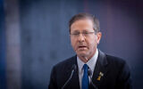 President Isaac Herzog at a memorial ceremony for people who were murdered during the October 7 massacre, at the Knesset in Jerusalem, October 28, 2024. (Chaim Goldberg/Flash90)
