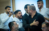 MK Almog Cohen argues with MK Ofer Cassif during a Knesset House Committee meeting, October 29, 2024. (Yonatan Sindel/Flash90)