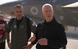 Defense Minister Yoav Gallant (right) with Brig. Gen. Yotam Sigler at the Nevatim air force base in southern Israel, October 6, 2024. (Elad Malka/Defense Ministry)