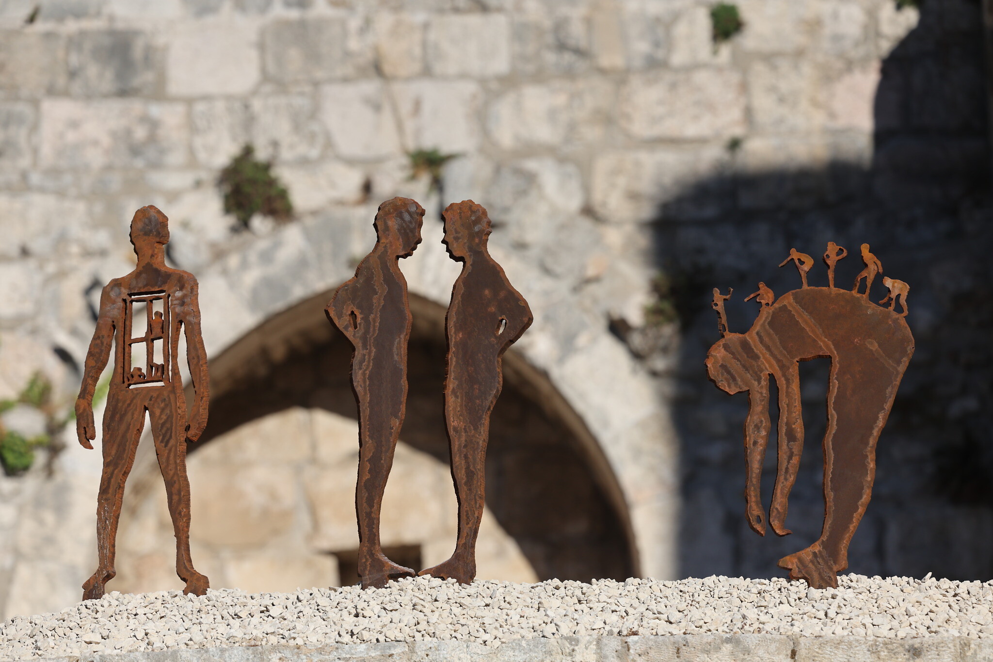 Vivid sculptures displayed in ancient Jerusalem citadel reflect