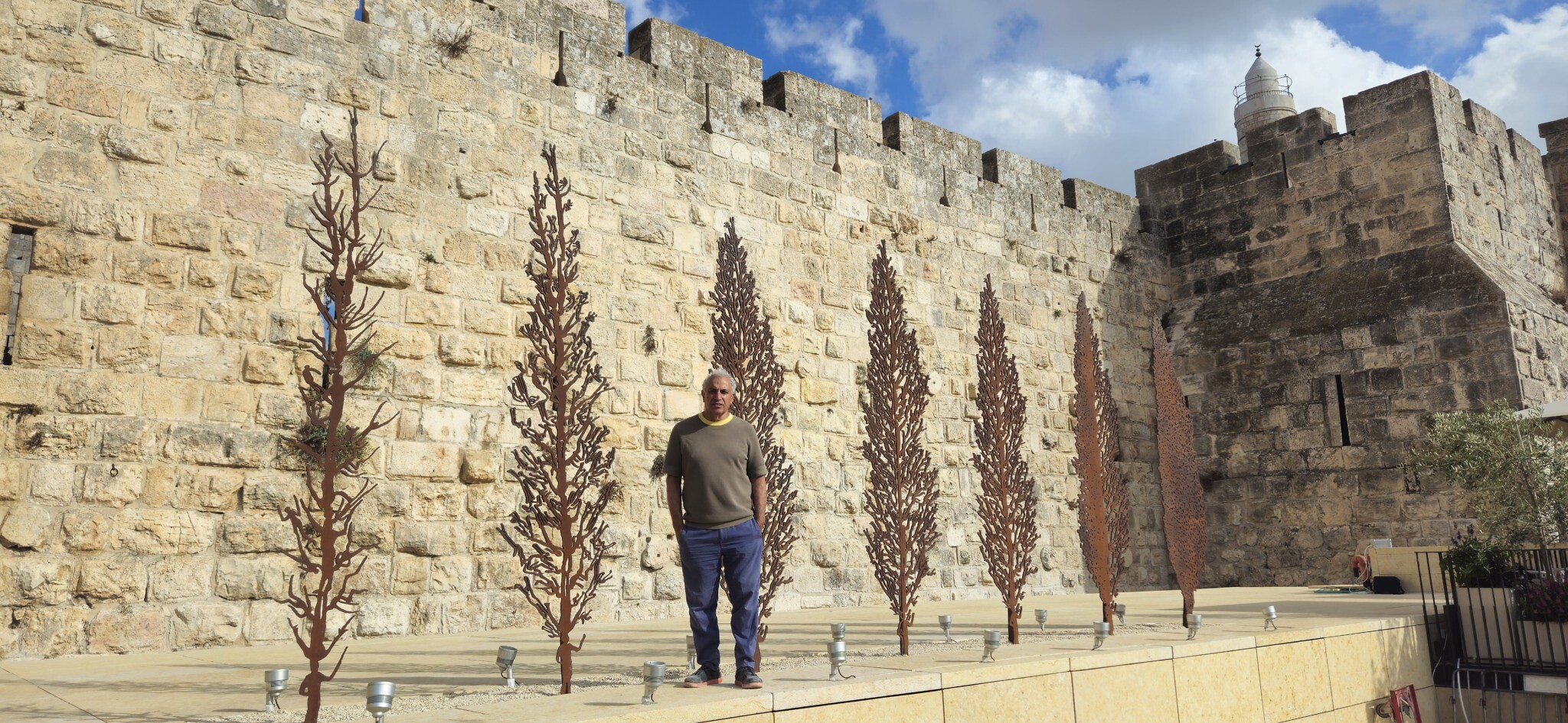 Vivid sculptures displayed in ancient Jerusalem citadel reflect