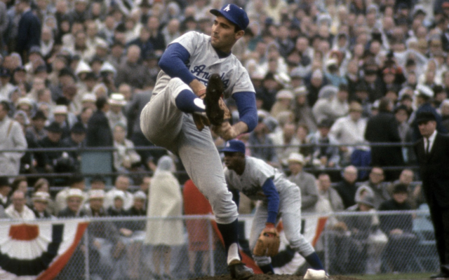 Sandy Koufax pitches during Game 7 of the 1965 World Series between the Los Angeles Dodgers and the Minnesota Twins, Oct. 14, 1965, at Metropolitan Stadium in Minneapolis. (Focus on Sport/Getty Images, via JTA)