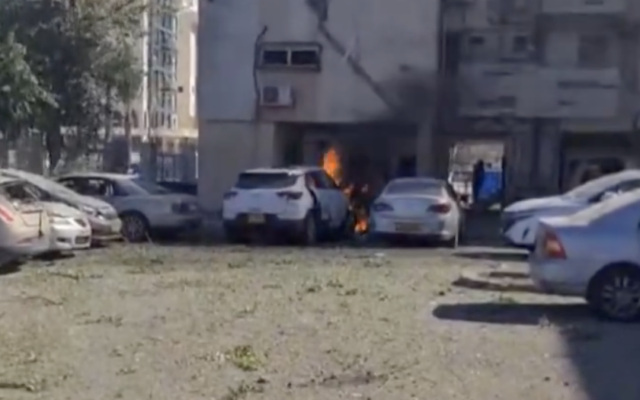 A view of damage to a residential building and a fire that erupted after a rocket from Lebanon impacted in Kiryat Ata, near Haifa, October 19, 2024. (Screenshot, used in accordance with Clause 27a of the Copyright Law)