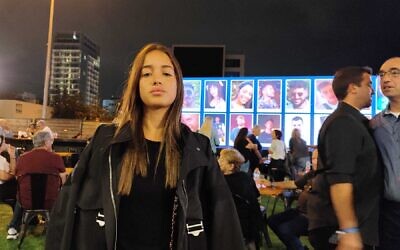 Ofri Rahum, who lost several relatives on October 7, 2023, at a Tel Aviv memorial event for bereaved families of victims of the Nova festival massacre, on October 6, 2024. (Gavriel Fiske/Times of Israel)